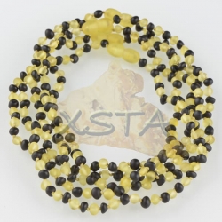 Raw yellow black amber teething necklace Raw yellow black amber teething necklace